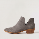 Black ankle boots for women featuring a stylish tasselled back zip, low stacked heel, and elegant V-front design, made from vegan material. 5