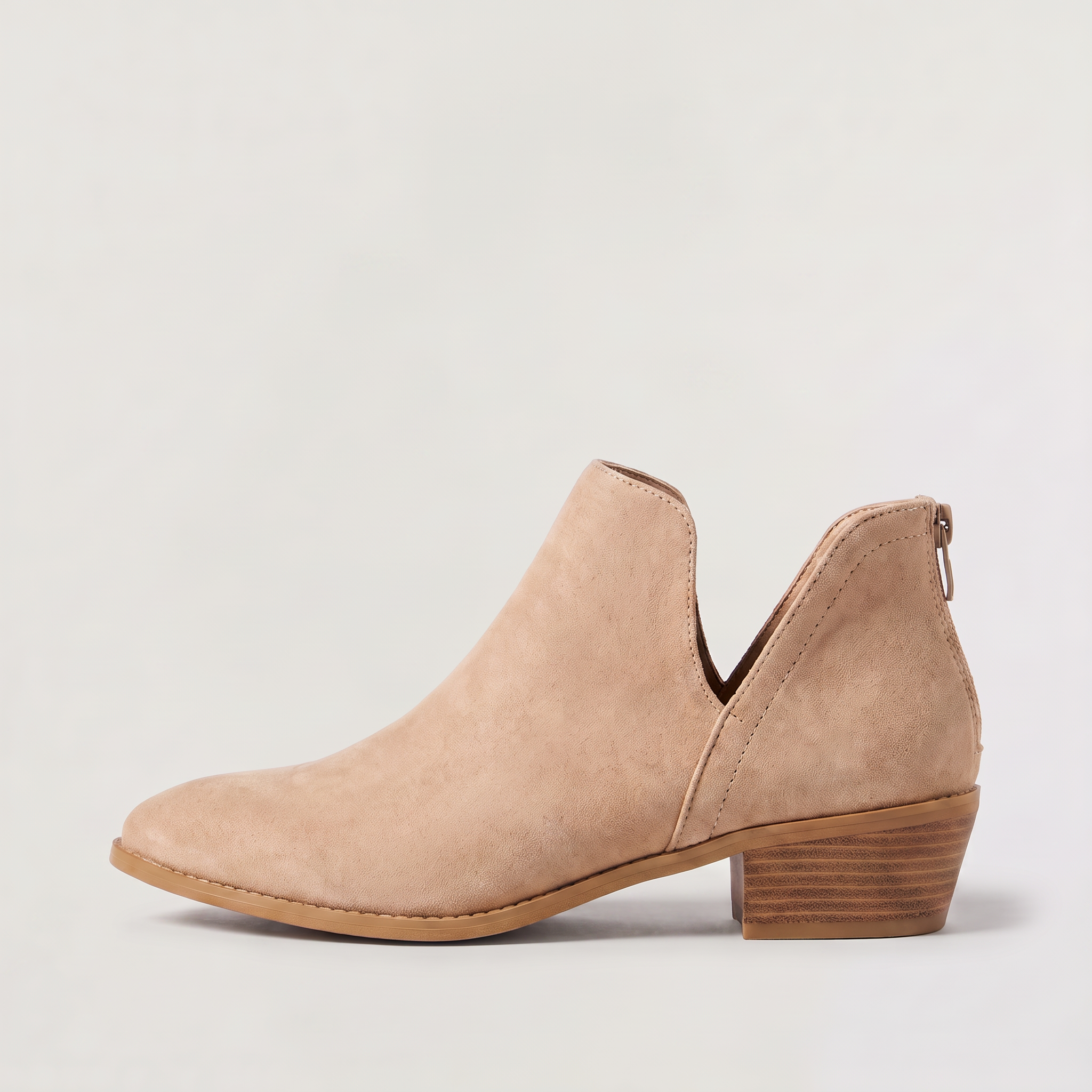 Black ankle boots for women featuring a stylish tasselled back zip, low stacked heel, and elegant V-front design, made from vegan material. 6