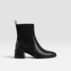 Black Chelsea ankle boots for women featuring a stylish square toe and block heel, designed for easy pull-on wear, perfect for both casual and formal outfits. 1