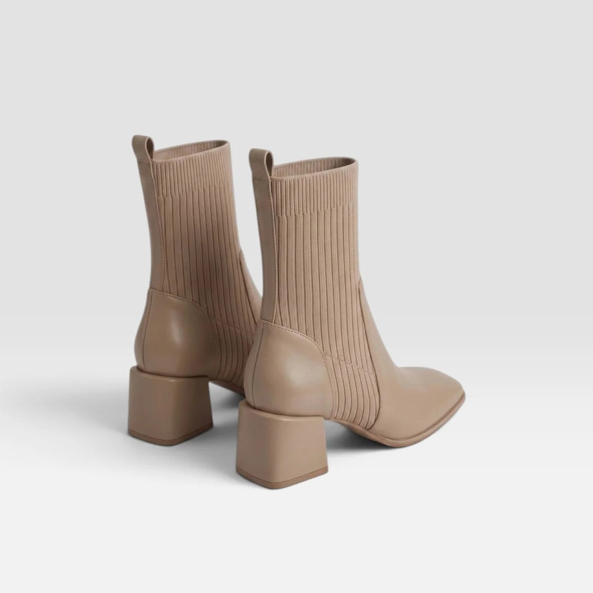 Black Chelsea ankle boots for women featuring a stylish square toe and block heel, designed for easy pull-on wear, perfect for both casual and formal outfits. 4