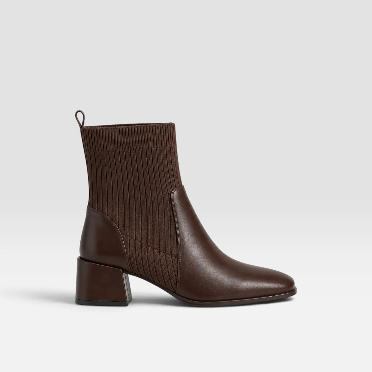 Black Chelsea ankle boots for women featuring a stylish square toe and block heel, designed for easy pull-on wear, perfect for both casual and formal outfits. 9