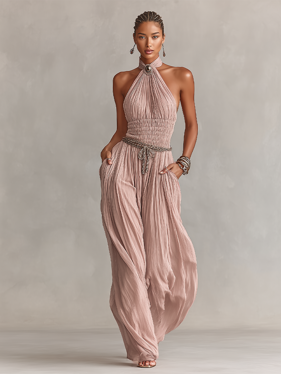 Blush jumpsuit featuring a ruched waist and wide-leg design, showcasing an elegant halter neck style perfect for formal occasions. 5