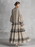 Bohemian maxi dress featuring long sleeves and a ruffled skirt in a stylish brown and white stripe cotton blend, perfect for casual and semi-formal occasions 4