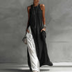 Boho maxi dress for women featuring a sleeveless A-line design, made from lightweight fabric, and designed with convenient pockets for summer outings. 4