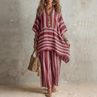 Boho vintage women's outfit featuring a stylish V-neck top and wide leg pants with a chic striped design, perfect for summer holidays. 0