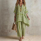 Boho vintage women's outfit featuring a stylish V-neck top and wide leg pants with a chic striped design, perfect for summer holidays. 4