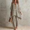 Boho vintage women's outfit featuring a stylish V-neck top and wide leg pants with a chic striped design, perfect for summer holidays. 5