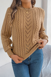Cozy cable knit sweater for women featuring a stylish chevron pattern and trendy puff sleeves, perfect for fall and winter wear. 0