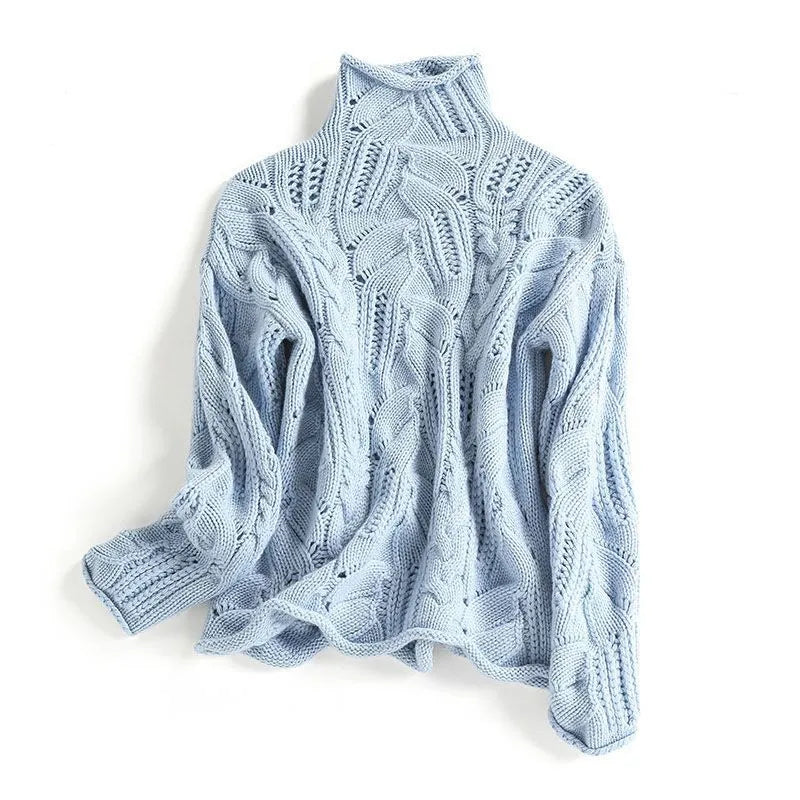 Soft chunky knit women's cable knit sweater featuring a cozy turtleneck and elegant pointelle detail, perfect for stylish winter layering. 2