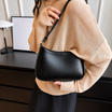 Shoulder Bag with Adjustable Strap – Minimalist Vegan Leather Curved Design – Compact Everyday Purse