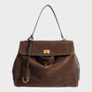Cowhide leather shoulder bag featuring a magnetic flap closure and an adjustable strap, perfect for everyday use and versatile styling. 12