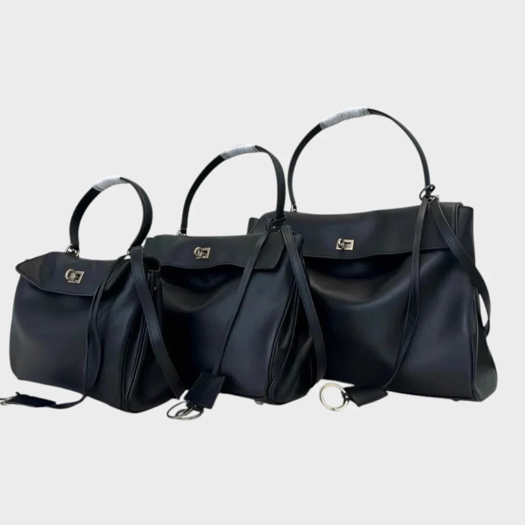 Cowhide leather shoulder bag featuring a magnetic flap closure and an adjustable strap, perfect for everyday use and versatile styling. 4