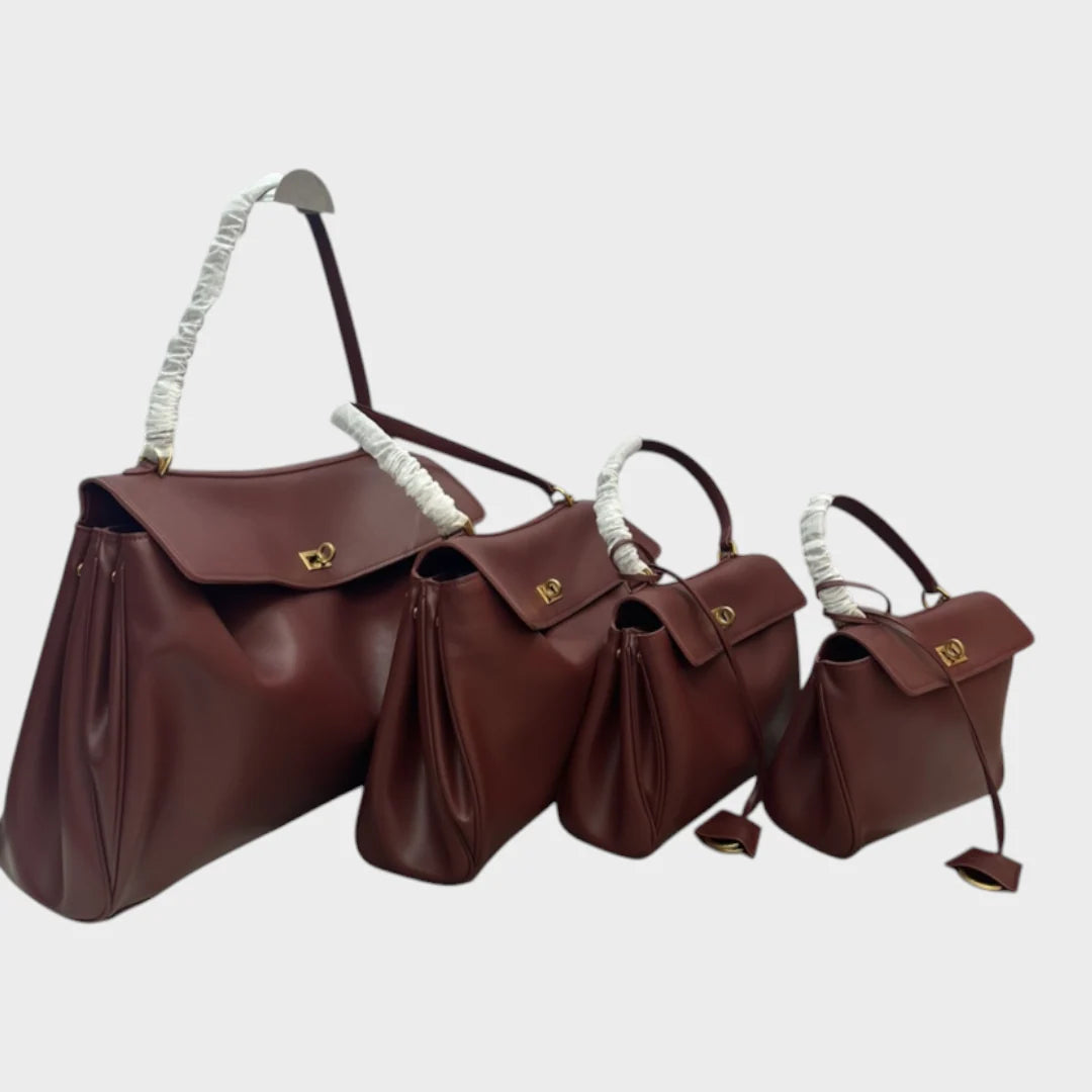 Cowhide leather shoulder bag featuring a magnetic flap closure and an adjustable strap, perfect for everyday use and versatile styling. 5