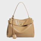 Cowhide leather shoulder bag featuring a magnetic flap closure and an adjustable strap, perfect for everyday use and versatile styling. 6