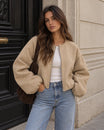 Cropped bomber jacket for women featuring a zip-up front and soft lightweight fleece design, perfect for stylish layering in cool weather. 5