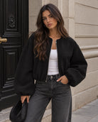 Cropped bomber jacket for women featuring a zip-up front and soft lightweight fleece design, perfect for stylish layering in cool weather. 6