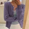 Cropped cardigan sweater for women featuring a button front and round neckline, made from soft cashmere-feel knit for ultimate comfort and style. 3