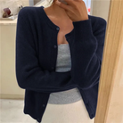 Cropped cardigan sweater for women featuring a button front and round neckline, made from soft cashmere-feel knit for ultimate comfort and style. 8