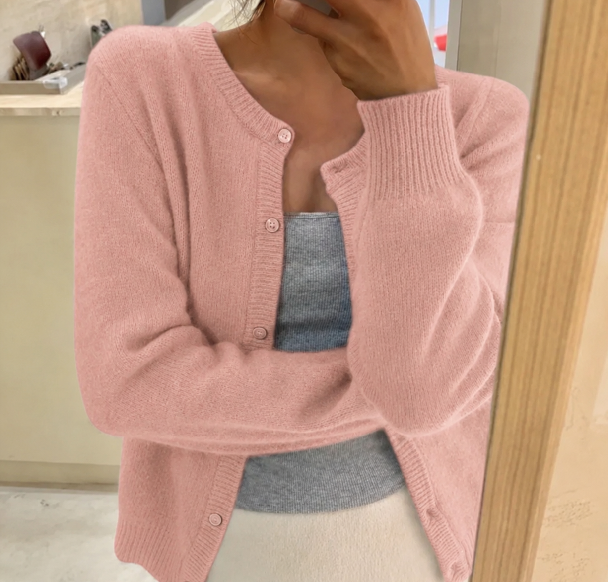 Cropped cardigan sweater for women featuring a button front and round neckline, made from soft cashmere-feel knit for ultimate comfort and style. 9