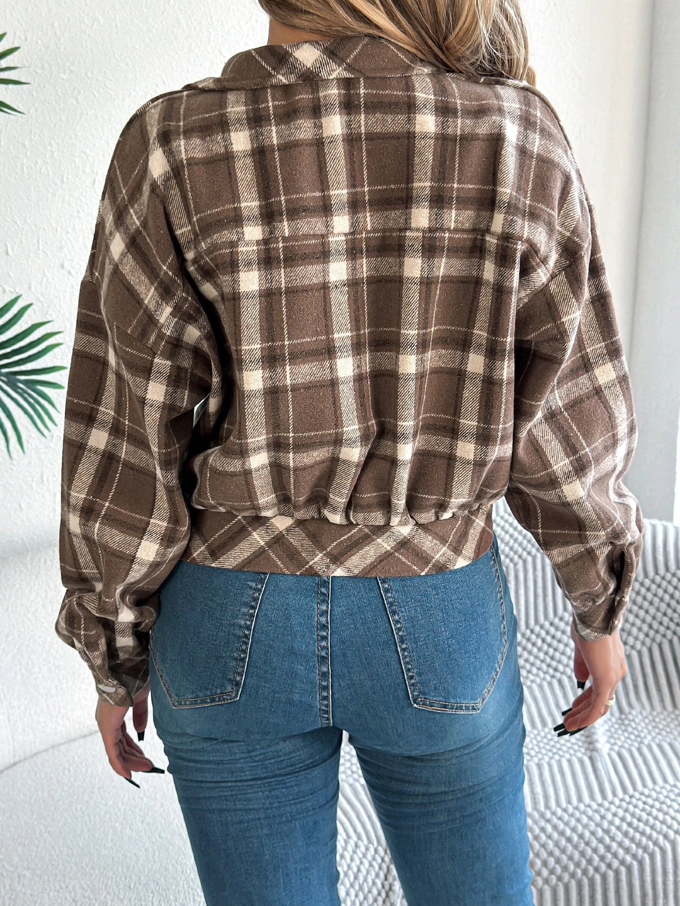 Cropped plaid shacket for women featuring a button front and chest pockets, made from soft flannel for a casual layered look. 1