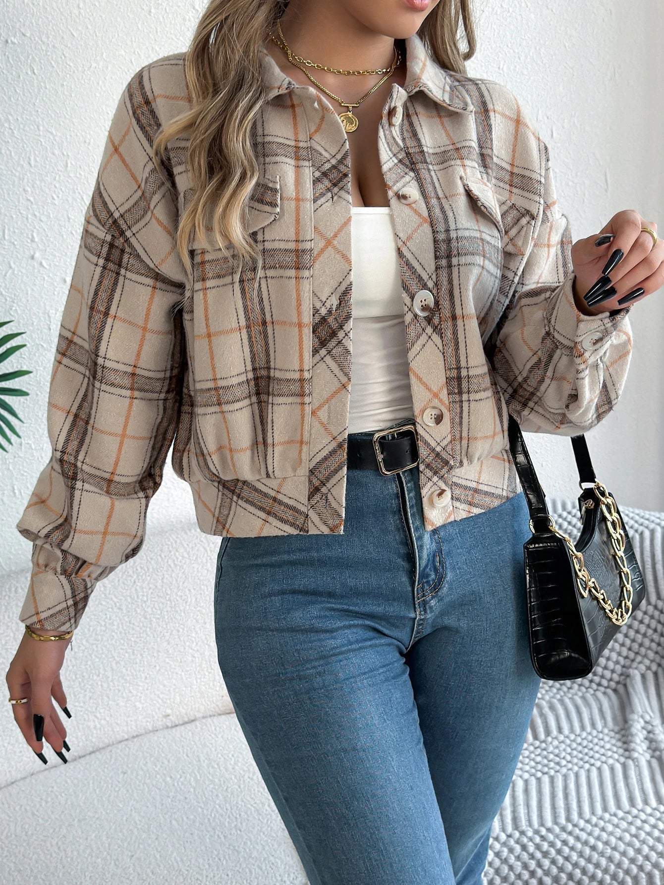 Cropped plaid shacket for women featuring a button front and chest pockets, made from soft flannel for a casual layered look. 6