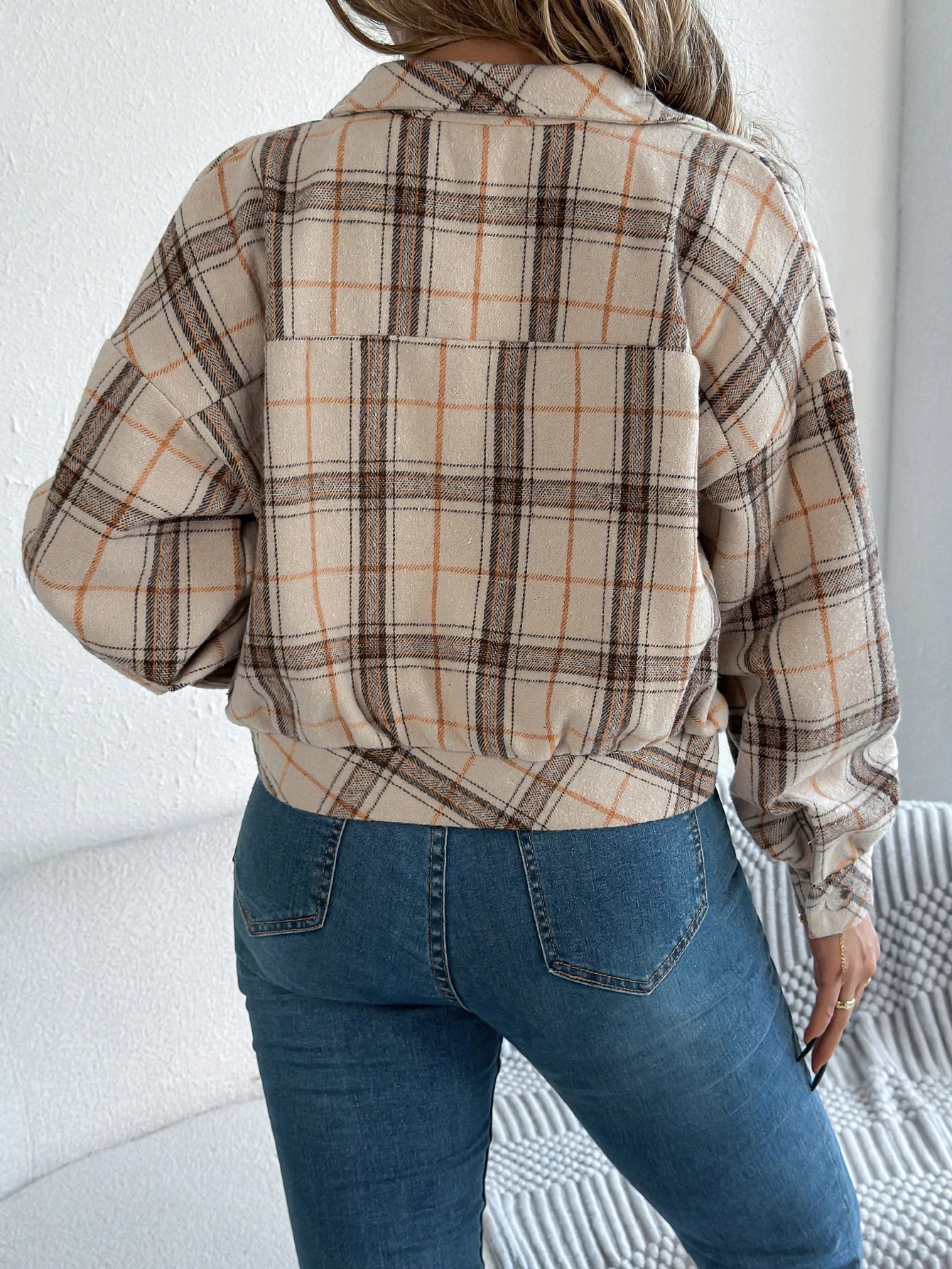 Cropped plaid shacket for women featuring a button front and chest pockets, made from soft flannel for a casual layered look. 7