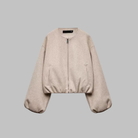 Cropped zip jacket with collarless neckline in soft structured design, perfect for a stylish and modern look. 2