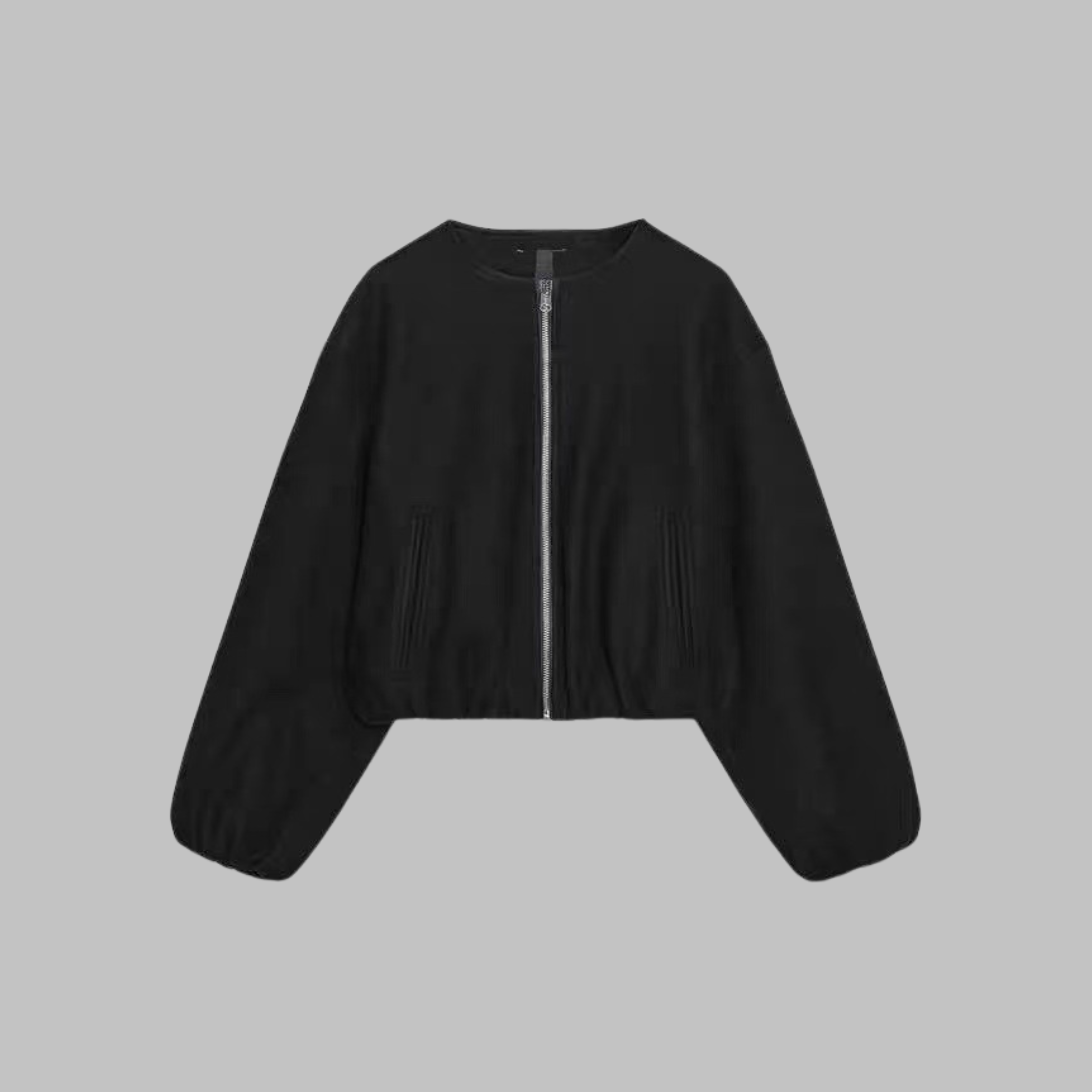 Cropped zip jacket with collarless neckline in soft structured design, perfect for a stylish and modern look. 3