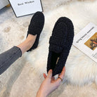 Cushioned slippers with plush lining in black, beige, and brown, featuring a closed-toe slip-on design for ultimate comfort and style. 0