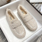 Cushioned slippers with plush lining in black, beige, and brown, featuring a closed-toe slip-on design for ultimate comfort and style. 2