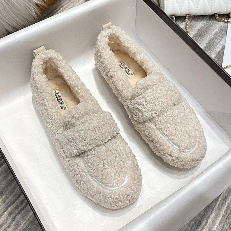 Cushioned slippers with plush lining in black, beige, and brown, featuring a closed-toe slip-on design for ultimate comfort and style. 2