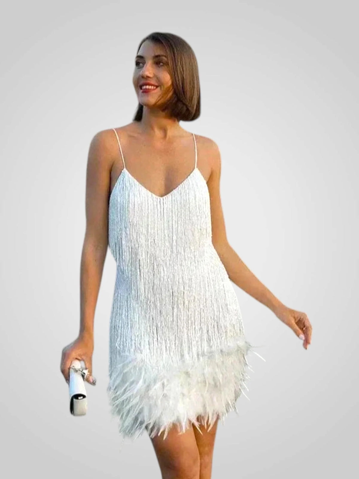 Elegant feathered mini dress featuring a chic silhouette, perfect for stylish parties and special occasions. 2