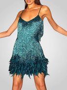 Elegant feathered mini dress featuring a chic silhouette, perfect for stylish parties and special occasions. 5