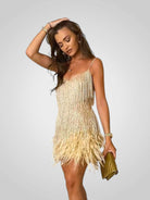 Elegant feathered mini dress featuring a chic silhouette, perfect for stylish parties and special occasions. 6
