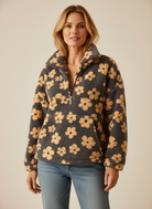 Fleece sweater for women featuring a relaxed fit, made from ultra-soft sherpa fabric with a stylish floral pattern. 0