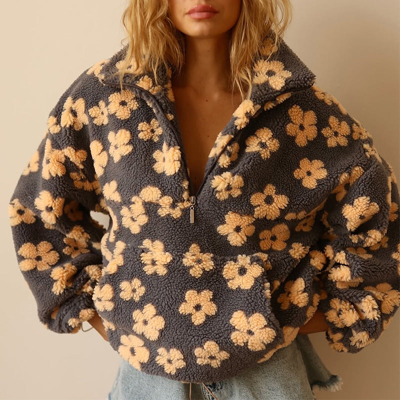 Fleece sweater for women featuring a relaxed fit, made from ultra-soft sherpa fabric with a stylish floral pattern. 1