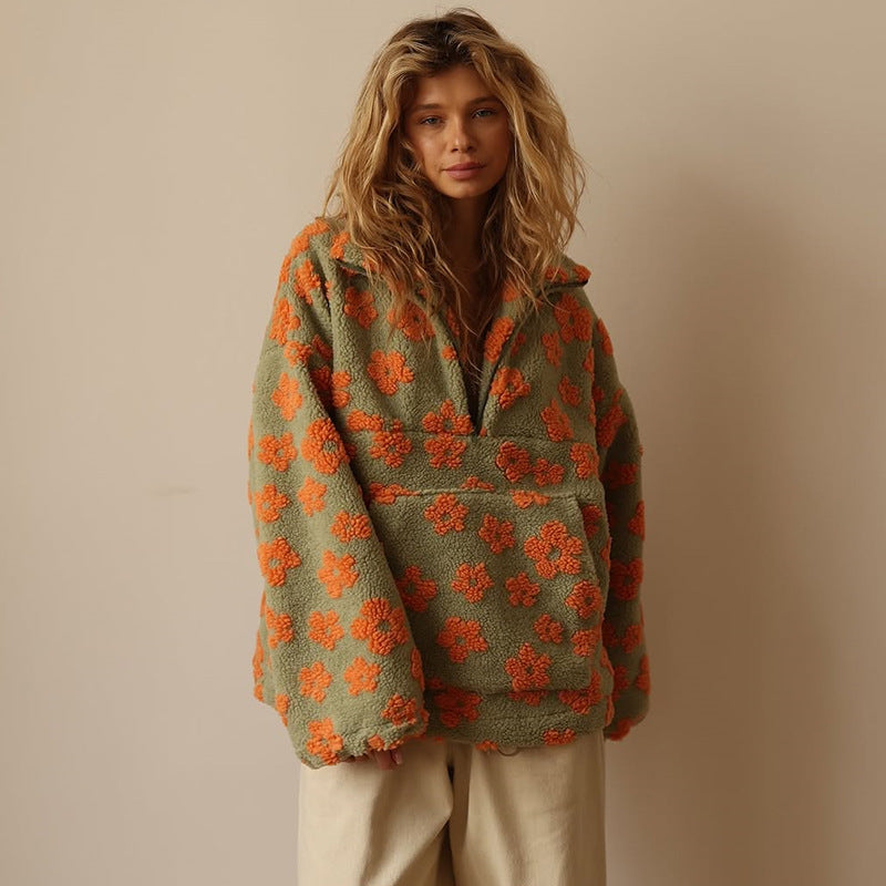 Fleece sweater for women featuring a relaxed fit, made from ultra-soft sherpa fabric with a stylish floral pattern. 3