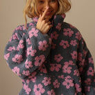 Fleece sweater for women featuring a relaxed fit, made from ultra-soft sherpa fabric with a stylish floral pattern. 5