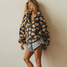 Fleece sweater for women featuring a relaxed fit, made from ultra-soft sherpa fabric with a stylish floral pattern. 8