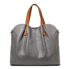 Genuine leather handbag with adjustable strap, featuring luxurious lychee grain cowhide, available in blue, black, pink, gray, and beige, designed 0