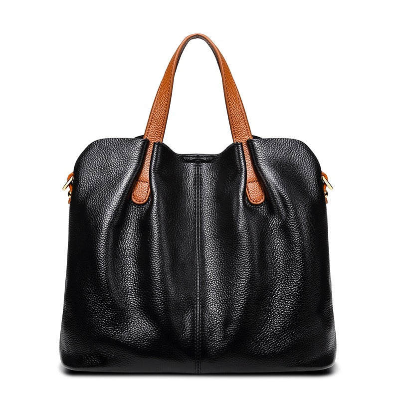 Genuine leather handbag with adjustable strap, featuring luxurious lychee grain cowhide, available in blue, black, pink, gray, and beige, designed 5