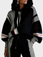 Geometric abstract print unisex hoodie made from a soft cotton blend, featuring a stylish hood, perfect for casual wear and contemporary fashion. 2