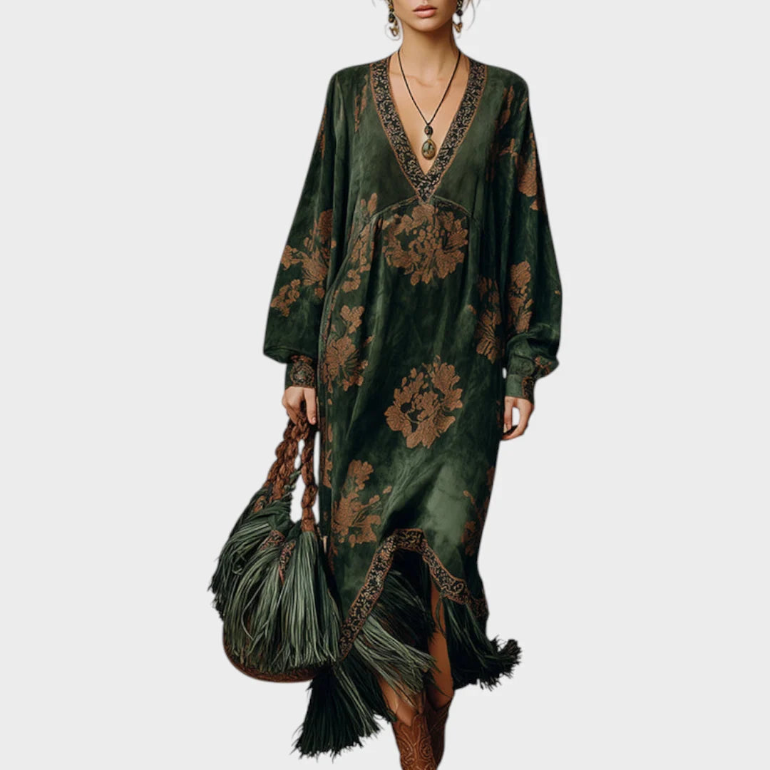 Green faux suede maxi dress featuring a retro print and playful pom-poms, designed with an elegant V-neck silhouette for a chic and stylish look. 0