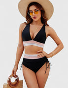 High waisted bikini set with tummy control, featuring elegant design and flattering fit for women, perfect for beach or poolside. 3