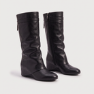 Knee high black boots for women featuring a stylish fold-over cuff and a comfortable low wedge heel, made with vegan upper materials. 4