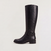 Knee high black riding boots for women with buckled ankle strap, made from faux leather and featuring a low stacked heel. 0