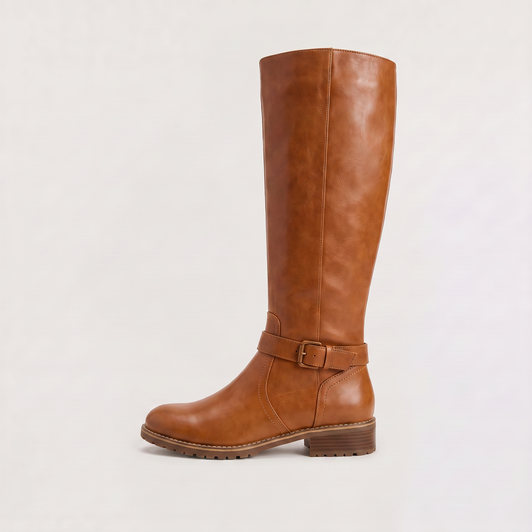 Knee high black riding boots for women with buckled ankle strap, made from faux leather and featuring a low stacked heel. 2