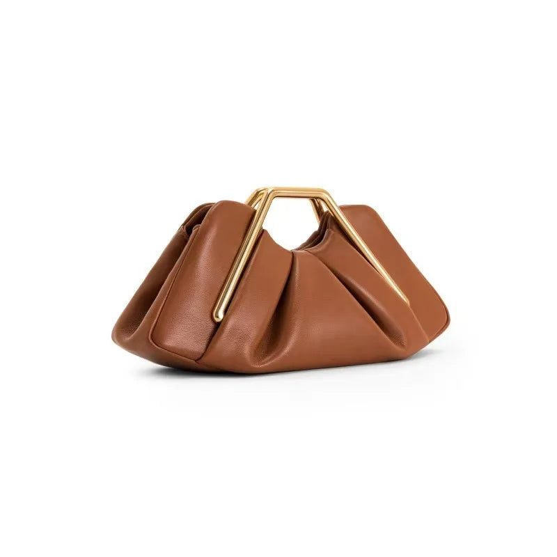 Stylish leather clutch bag featuring a gold handle, origami-inspired design, and a spacious interior made from high-quality microfiber leather. 3