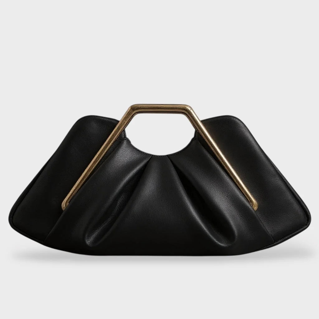 Stylish leather clutch bag featuring a gold handle, origami-inspired design, and a spacious interior made from high-quality microfiber leather. 6