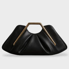 Stylish leather clutch bag featuring a gold handle, origami-inspired design, and a spacious interior made from high-quality microfiber leather. 6